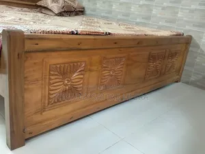 Full Akashmoni wood bed, 2 inches wide, 6ft/7ft. Selling with mattress.
