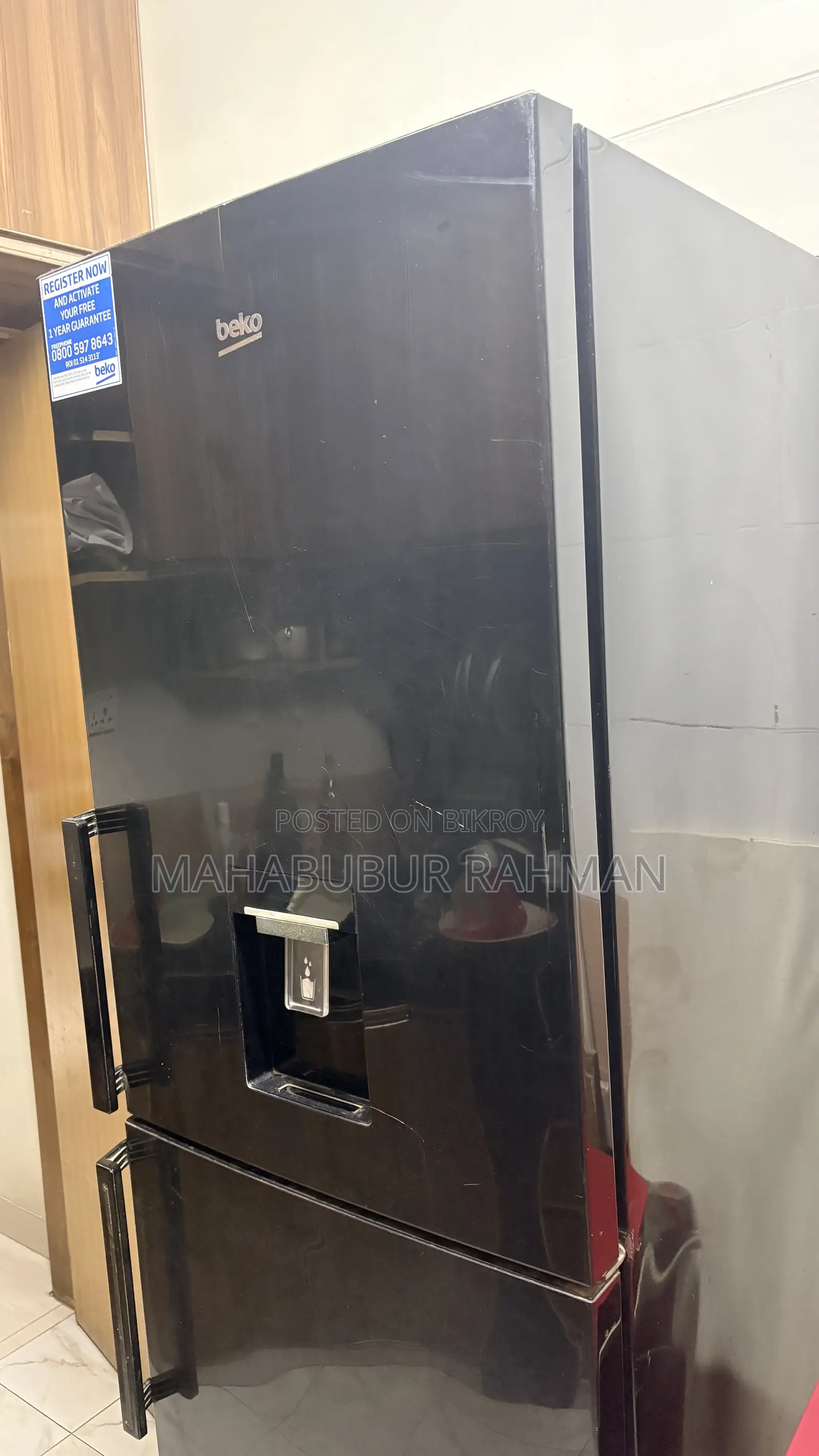Tall Black Beko Fridge With Dispenser