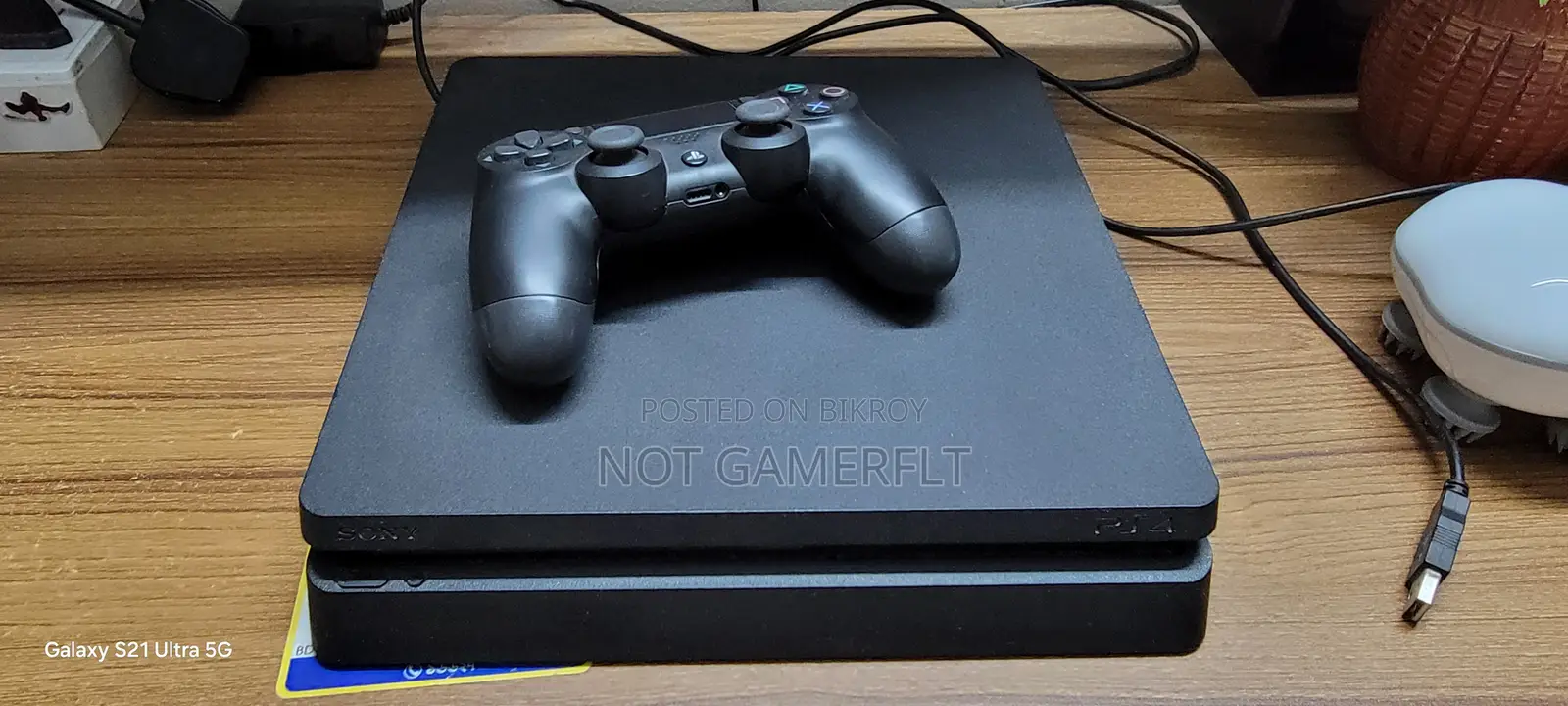 PS4 With Controller and 3 CDs (FIFA 20, GTA 5, Ghost of Tsushima)