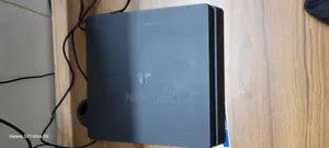 PS4 With Controller and 3 CDs (FIFA 20, GTA 5, Ghost of Tsushima)