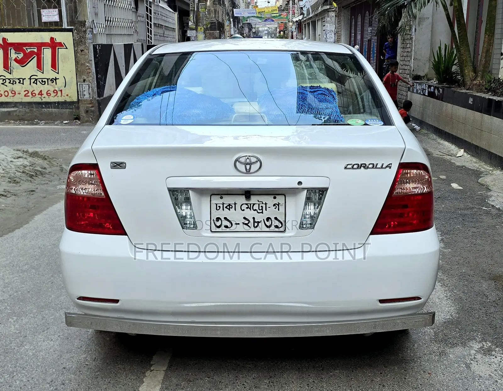 টয়োটা করোলা ২০০৫ হোয়াইট