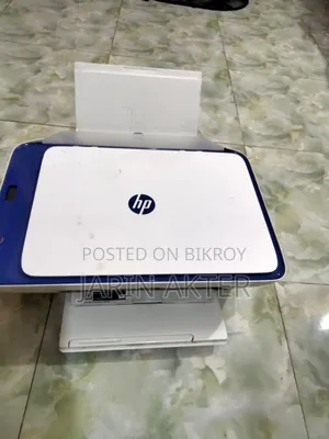 Printer with scanner, supports WiFi and Bluetooth connectivity.