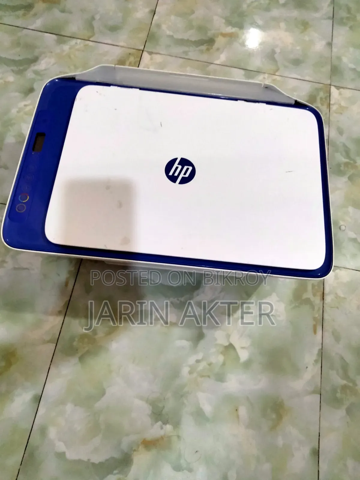 Printer with scanner, supports WiFi and Bluetooth connectivity.