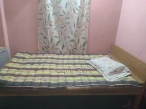 Bed, Mattress, Pillow, and Table