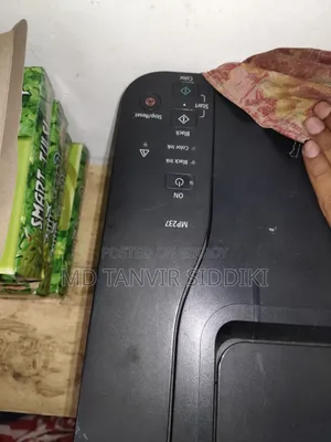 This printer turns on but the output cable is missing.