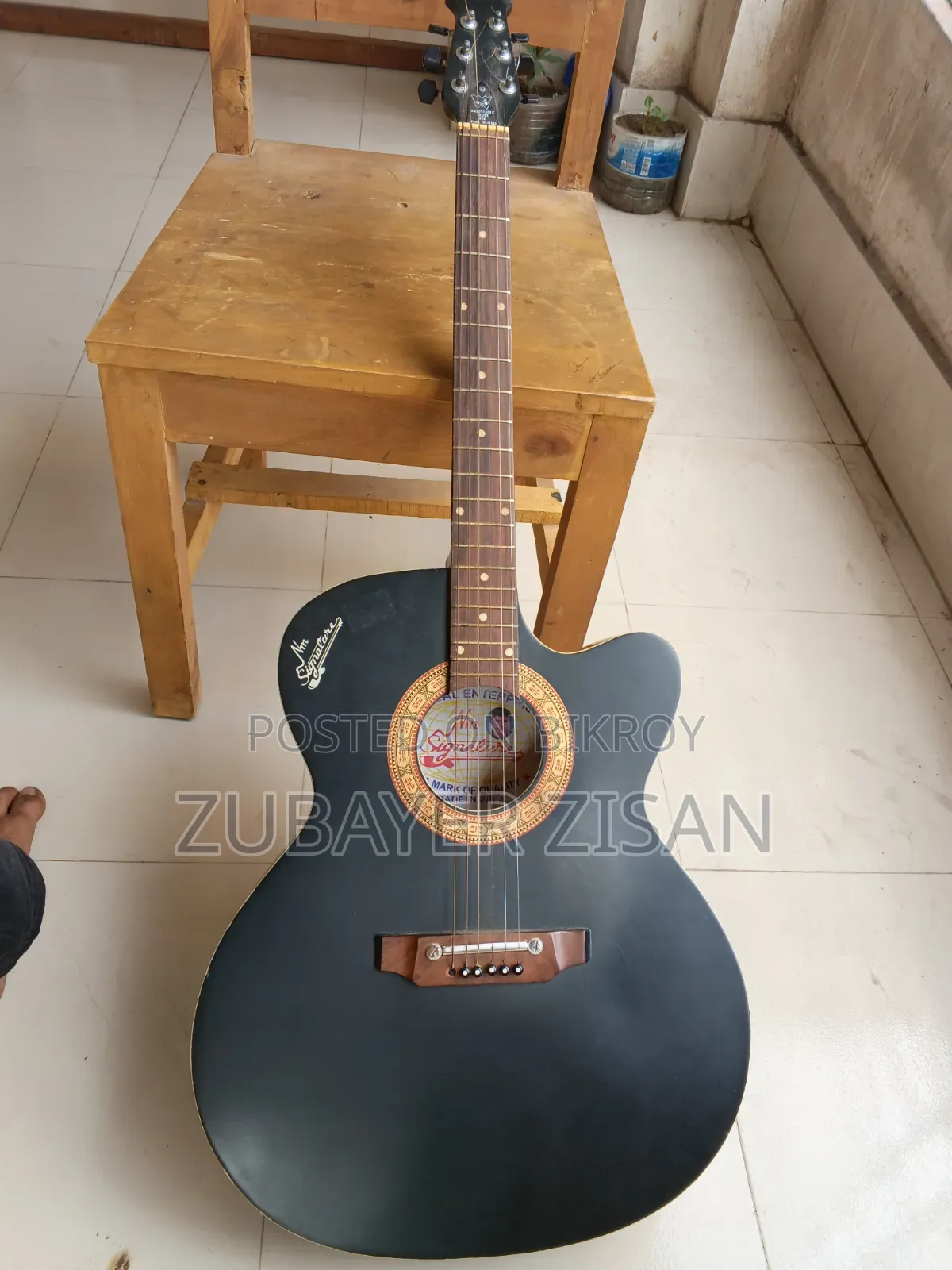 Selling my Signature acoustic guitar in new condition.