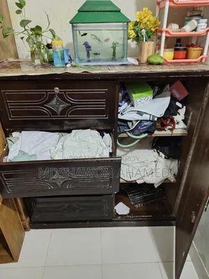 Wardrobe for sale at an attractive price (old) chair free