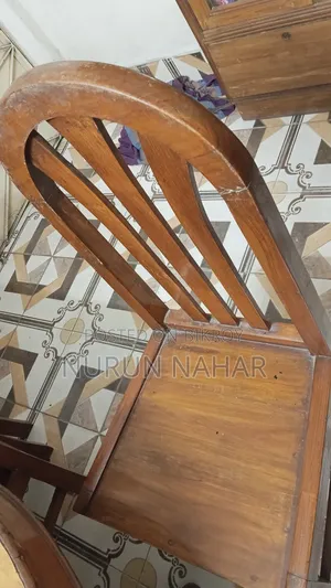 Dining Table. Six Chairs. Made of Teak Wood.