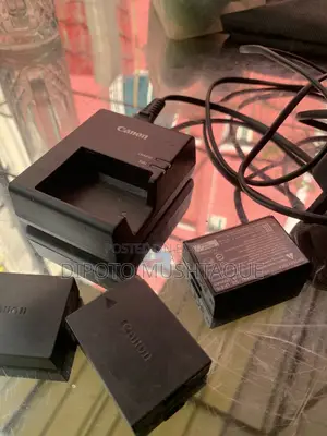 ক্যানন ইওএস ১১০০ডি এবং লেন্স সাথে ৩টি অরিজিনাল ক্যানন ব্যাটারি