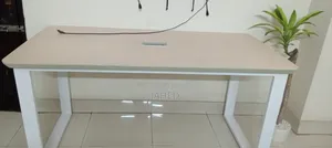 Selling 2 office-use tables.