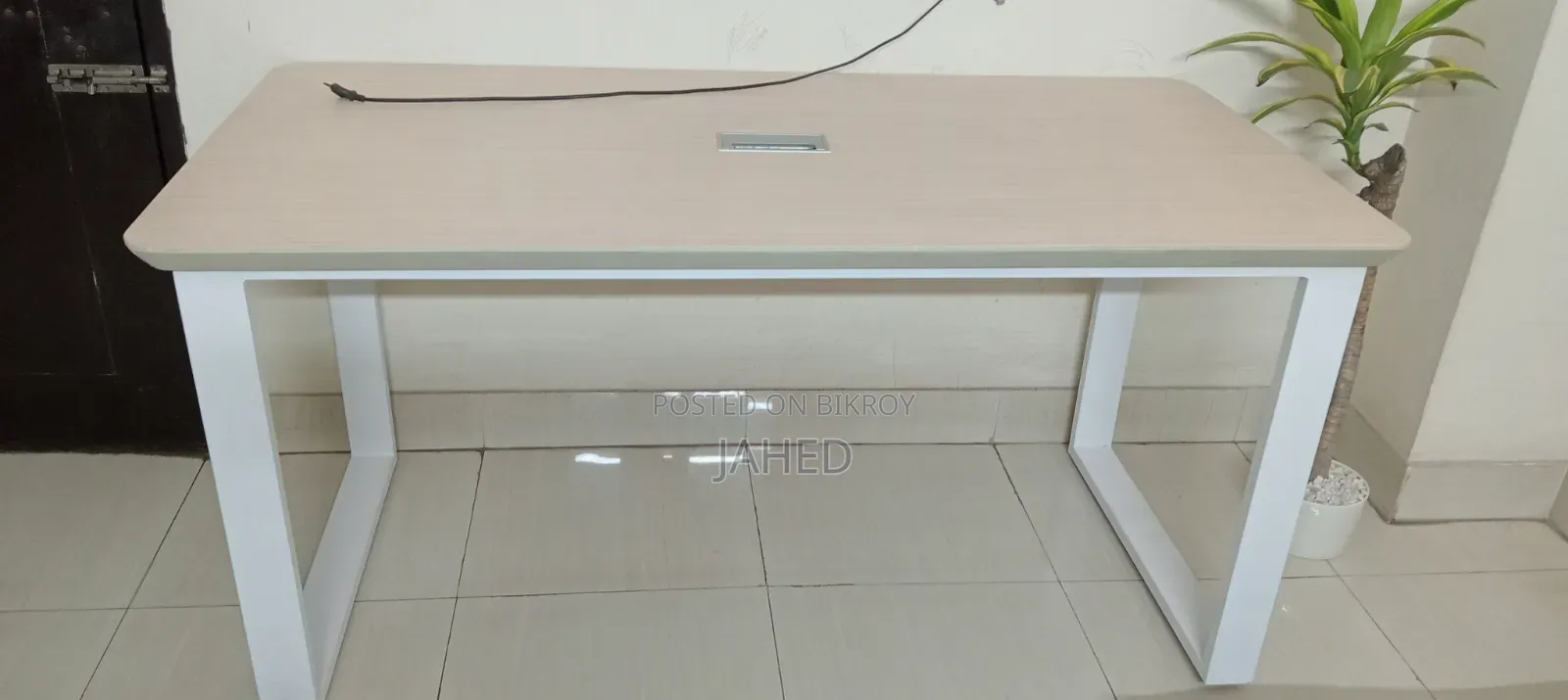 Selling 2 office-use tables.