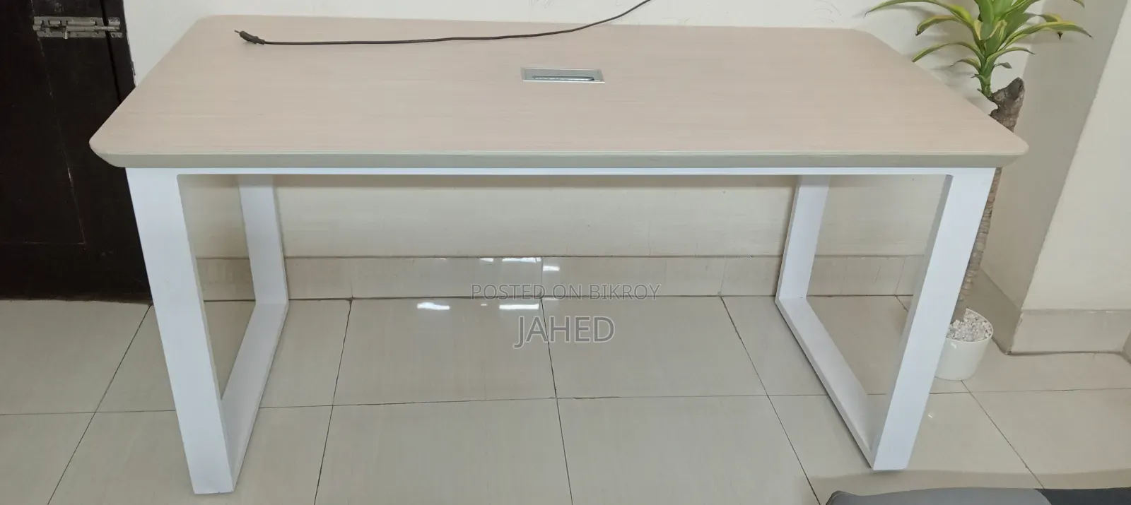 Selling 2 office-use tables.