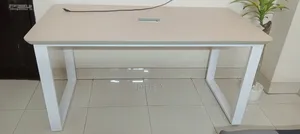 Selling 2 office-use tables.