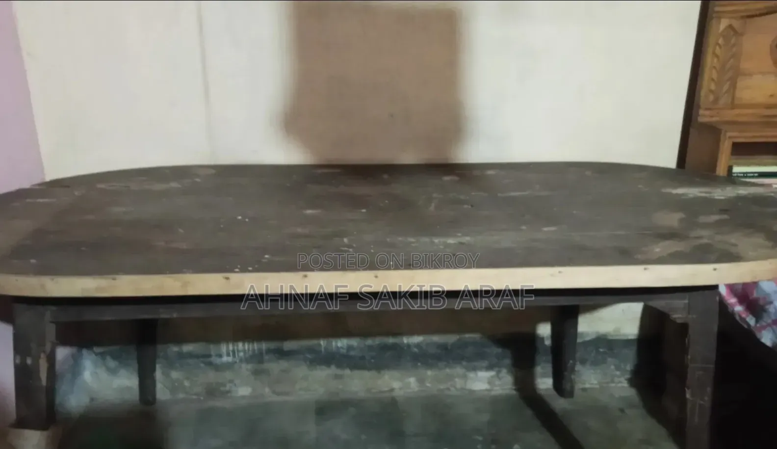 A large dining table for sale.