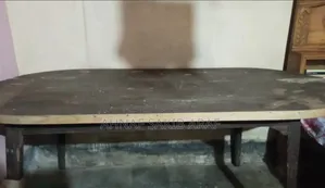 A large dining table for sale.