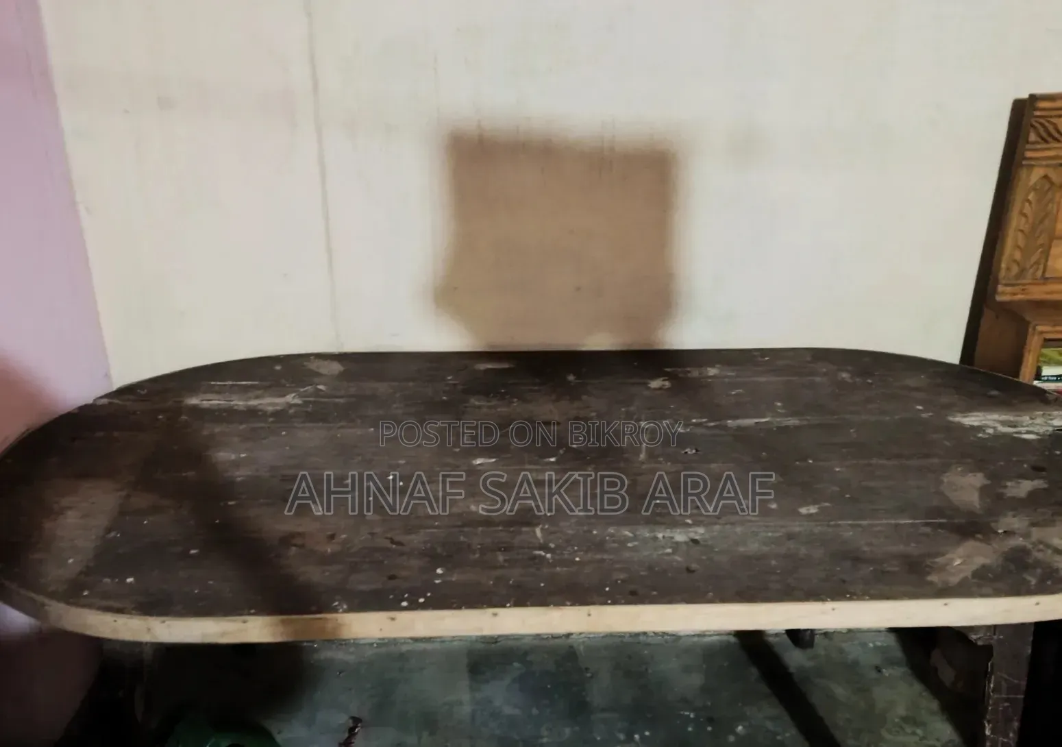 A large dining table for sale.