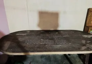 A large dining table for sale.
