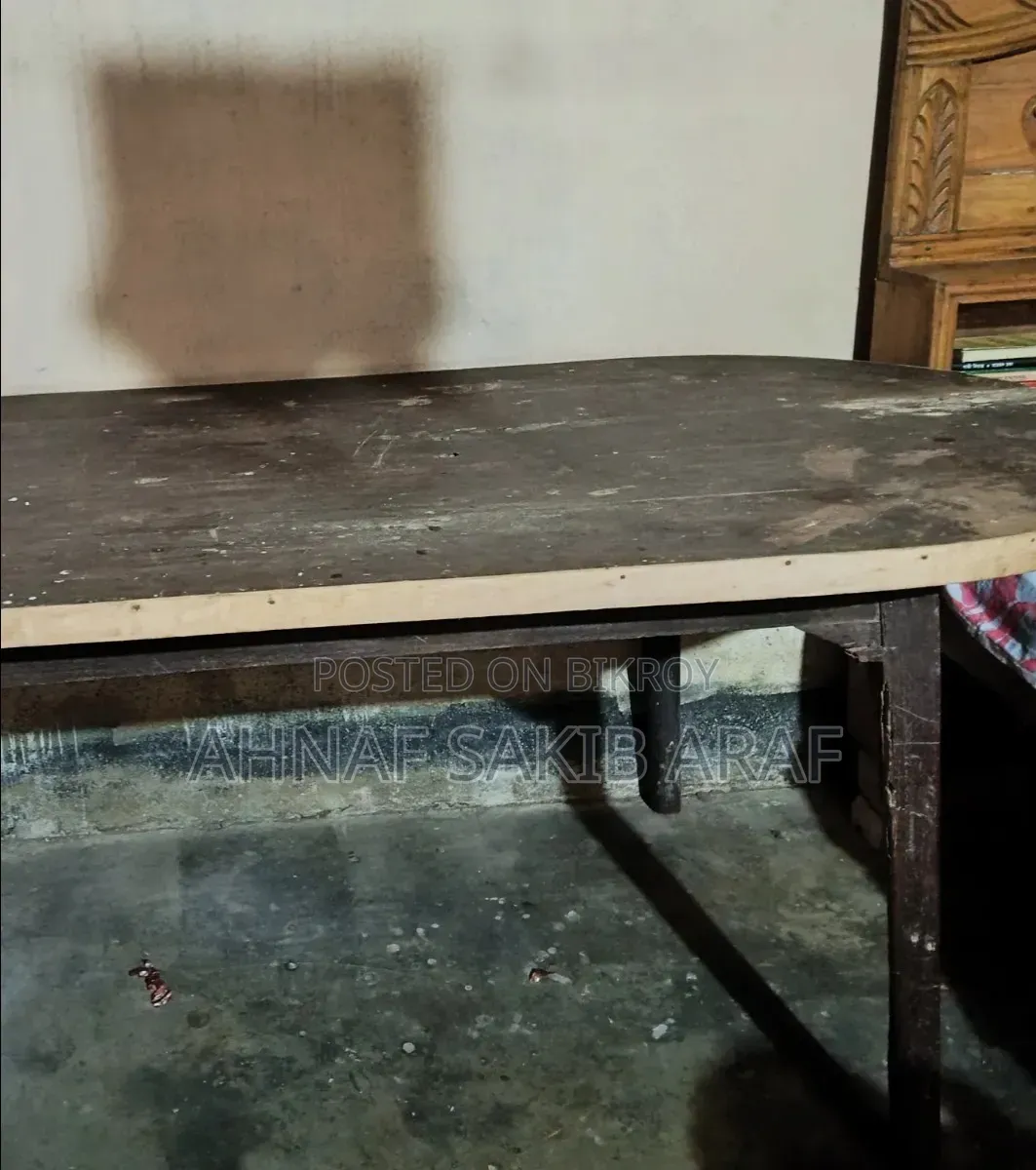 A large dining table for sale.