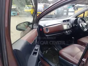 Toyota Vitz 1.3 AWD 5-door 2012 Brown