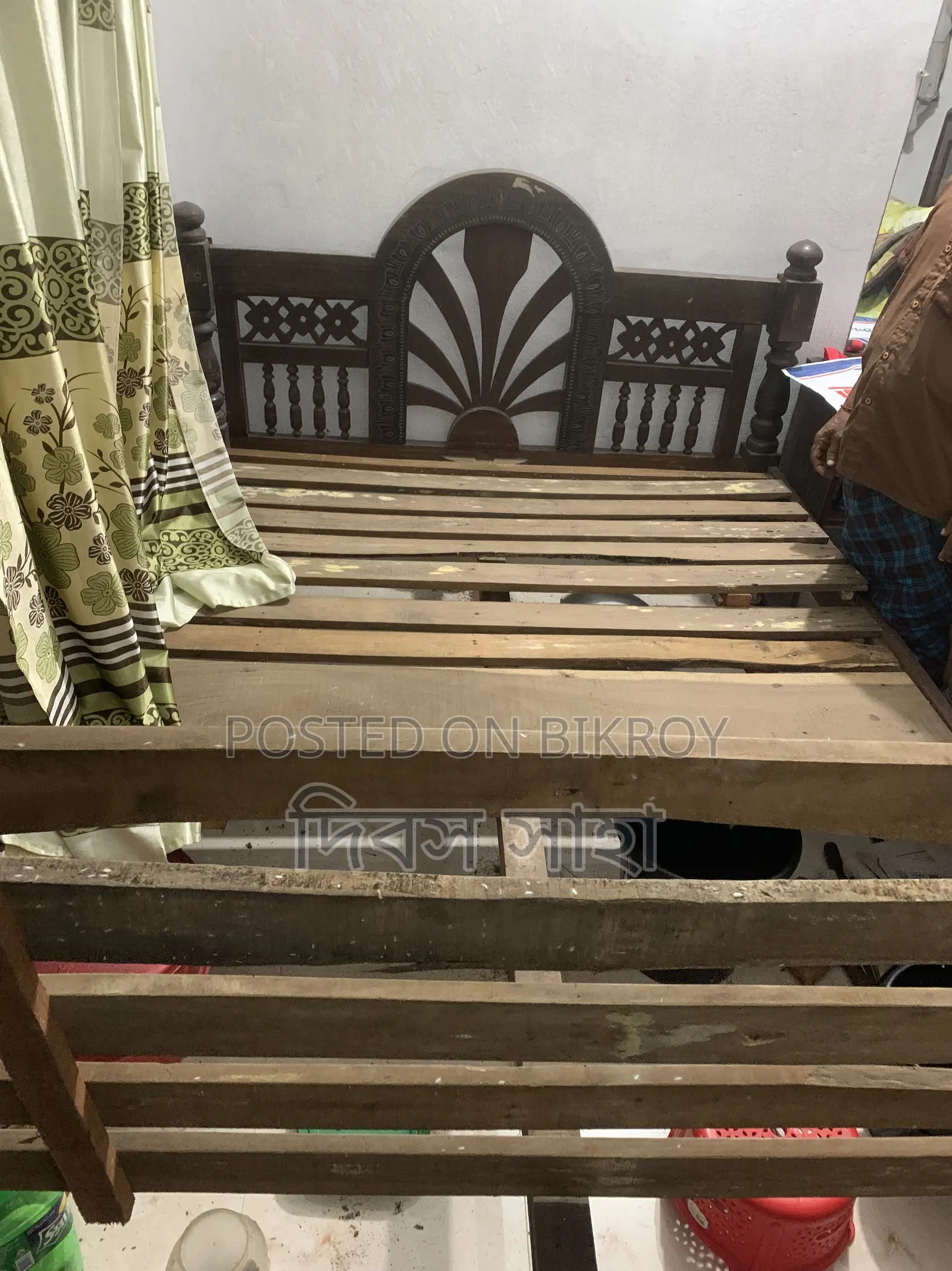 A used solid teak wood log for sale