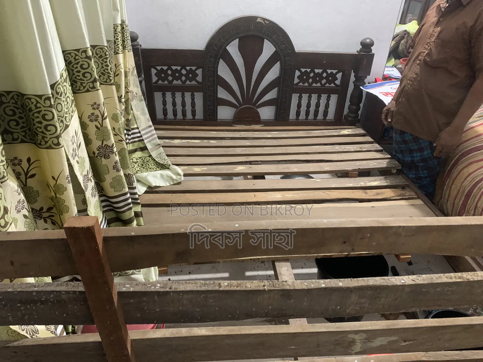 A used solid teak wood log for sale