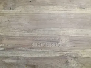 Large wooden dining table and 5 wooden chairs