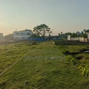 Residential plot for sale measuring 2.5 to 5 decimals with 3-sided and 2-sided road access