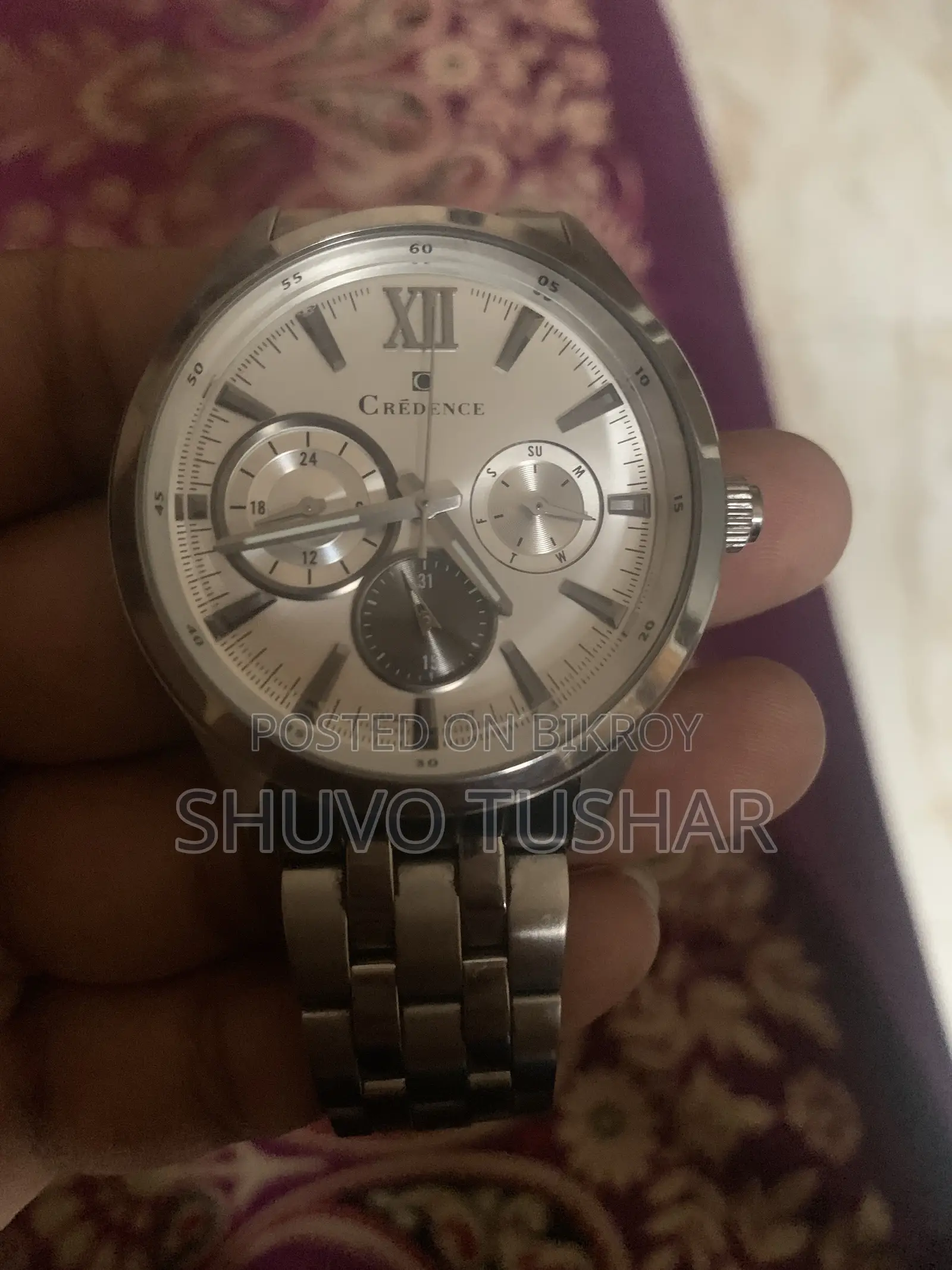 ক্রেডেন্স ঘড়ি