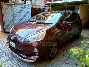 টয়োটা অ্যাকুয়া এস ২০১৪ মেরুন