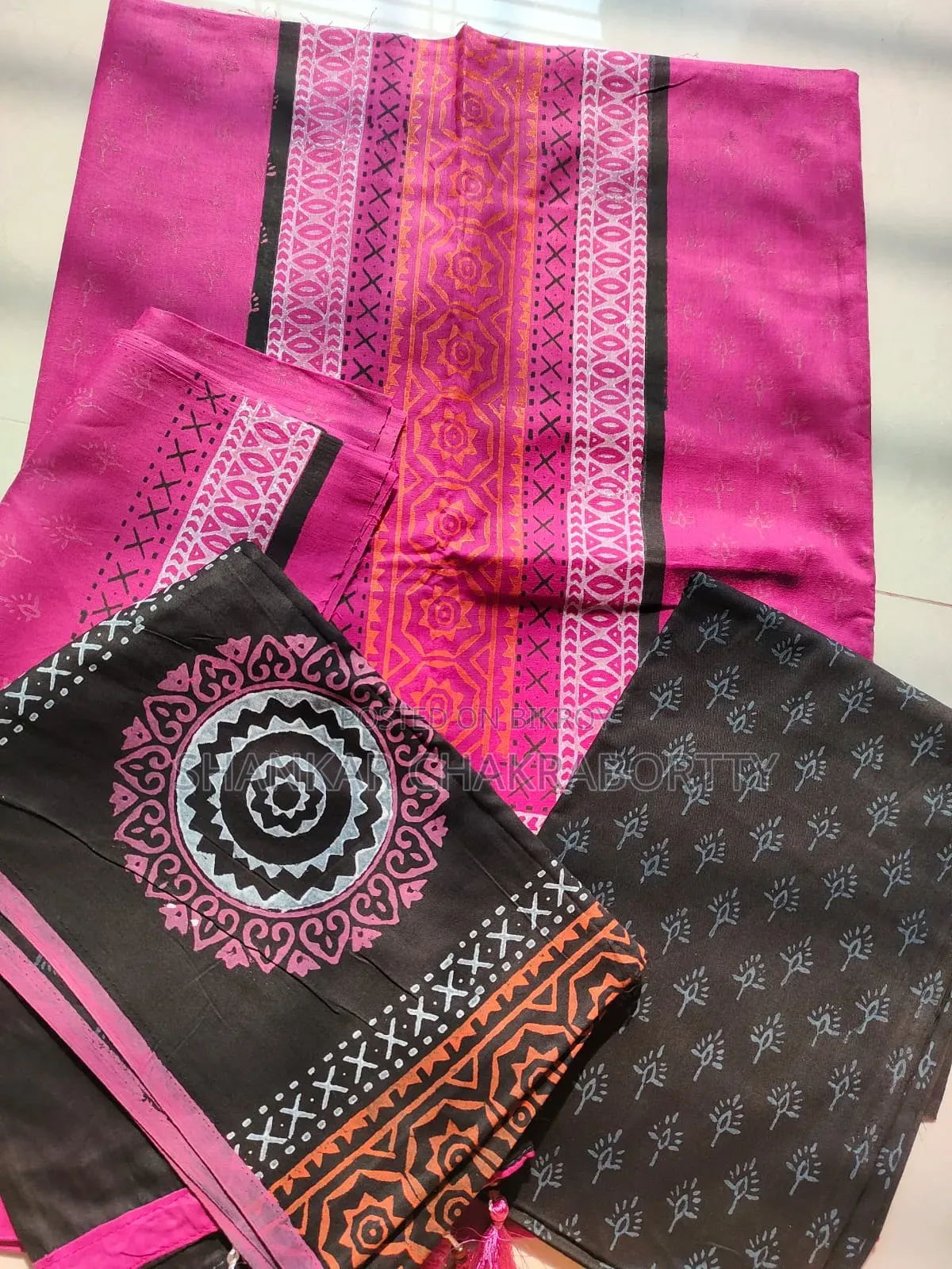 High-quality sarees, bed sheets, and three-piece sets available