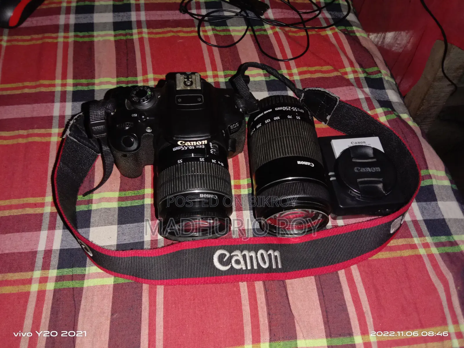 Canon 700D comes with 55-250 and 18-55 lenses, two chargers, and two batteries.