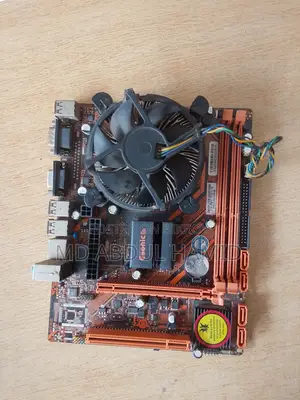 Esonic Ddr3 Motherboard + Intel Processor + Cpu Cooler For Sale
