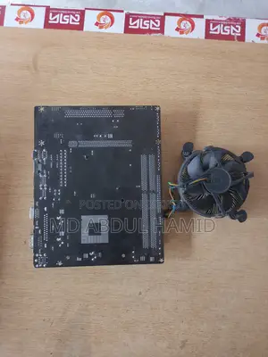 Esonic Ddr3 Motherboard + Intel Processor + Cpu Cooler For Sale