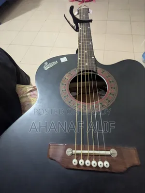 Guitar with 1 bag, 1 belt, and 3 picks as a gift