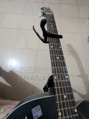 Guitar with 1 bag, 1 belt, and 3 picks as a gift