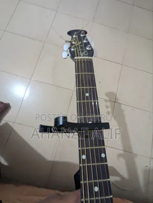 Guitar with 1 bag, 1 belt, and 3 picks as a gift
