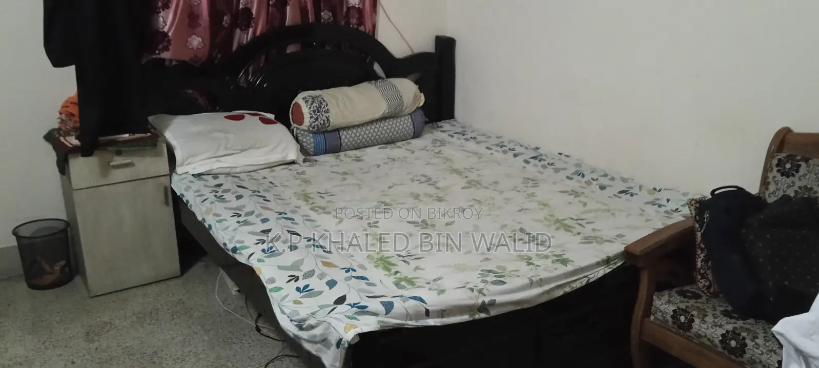 Old but large size wooden bed for sale.