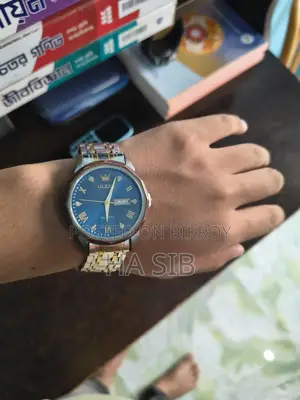 ওলেভস কোয়ার্টজ সিলভার কালার ঘড়ি