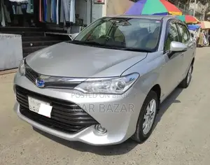 টয়োটা এক্সিও ১.৫ হাইব্রিড জি টু হুইল ড্রাইভ ২০১৫ সিলভার