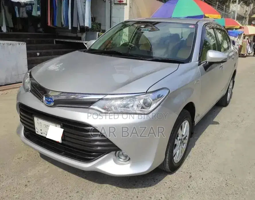 টয়োটা এক্সিও ১.৫ হাইব্রিড জি টু হুইল ড্রাইভ ২০১৫ সিলভার