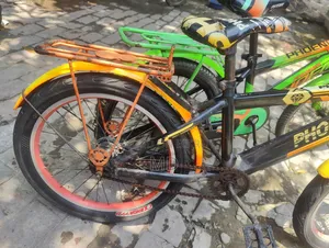 Green and Yellow Running 2 Bicycles