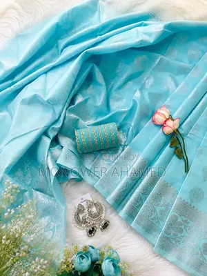 আকাশি রংঙের কম্ব শাড়ি