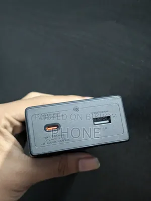 20000 mAh Power Bank. Attached Cable