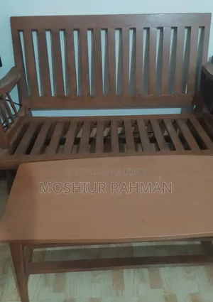 Sofa set (wooden) with tea table.