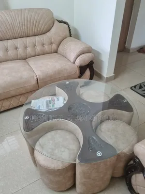 Leather Sofa. 2+2+1 with a tea table, including 4 stools.