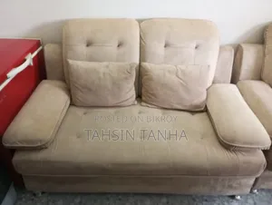 This is a 2+2+1 sofa. Includes 5 cushions. Brand new furniture.