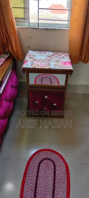 Home furniture set including a bed, cupboard, wardrobe, and dressing table