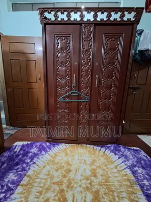 Akashmoni wood wardrobe, dressing table, and clothes rack for sale.