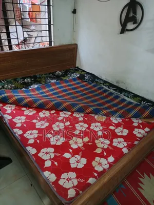 6/7 feet Teak wood bed with mattress and toshok for sale