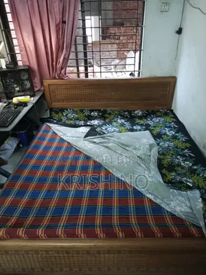 6/7 feet Teak wood bed with mattress and toshok for sale